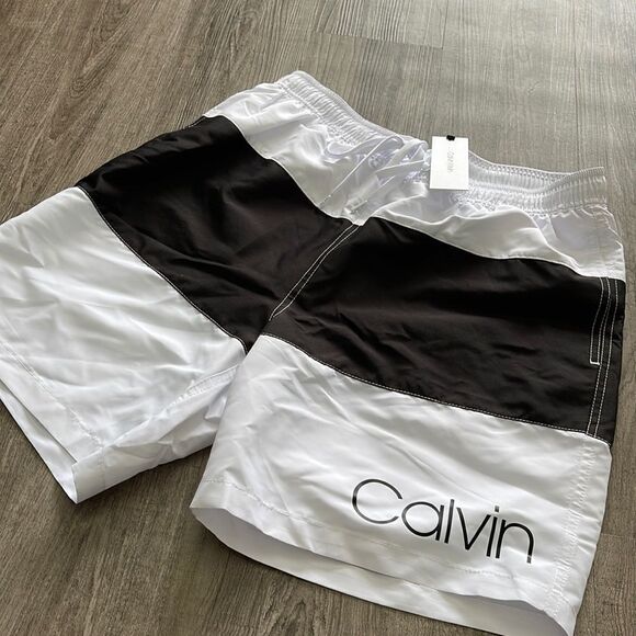 Calvin Klein
Men's Colorblocked 7" Swim Trunks - Picture 2 of 3